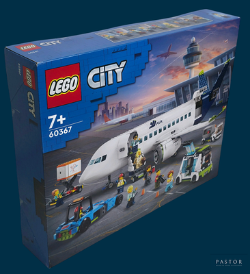 une boîte de Lego City contenant un avion sur le tarmac
