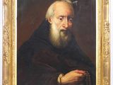 un tableau représentant un vieil homme barbu tenant un chapelet à la main