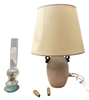 a lamp that is next to a lamp that is on a table