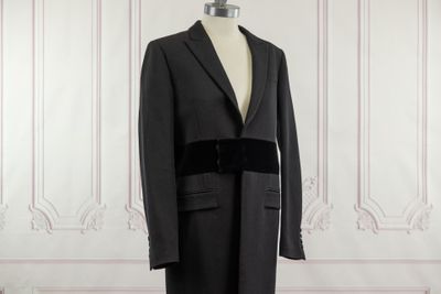 an image of a black coat on a mannequin