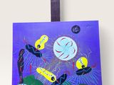tableau posé sur un chevalet représentant des oiseaux volant dans le ciel