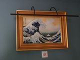 une photo d'un tableau accroché au mur