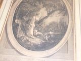 une image d'un tableau sur le mur d'une pièce