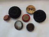 a lot of buttons that are on a table