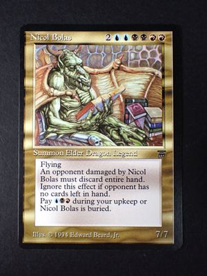 a close up of a card with a picture of a dragon on it