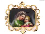 a picture of a woman holding a baby in a picture frame
