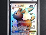 a close up of a pokemon card on a black surface