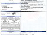 a close up of a document with a picture of a car on it