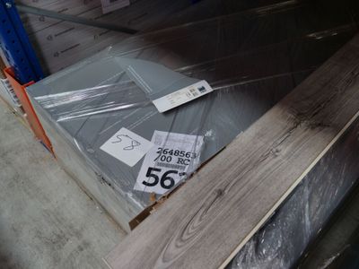 a lot of wood on the floor in the store