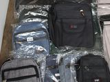 several pieces of luggage sitting on top of a wooden floor