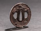 a small metal object that is sitting on a table