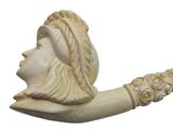 a statue of a man smoking a pipe with a lion head on it