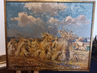 a picture of a painting of a cornfield on a easel