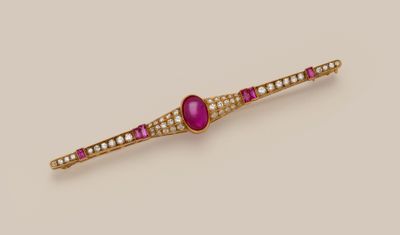 a ruby and diamond bar broochle