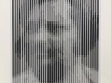 an image of a black and white photo of a woman ' s face