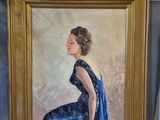 a painting of a woman in a blue dress next to a vase