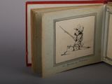 a book opened to show a drawing of a man holding a gun