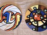 two plates that are sitting on a table