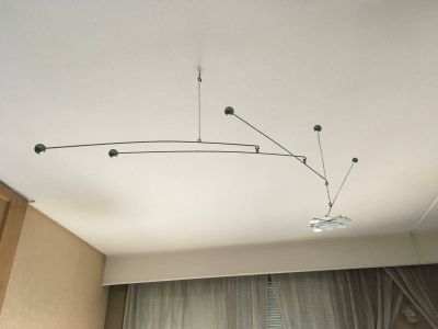 a light that is hanging from the ceiling in the room
