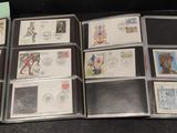 a lot of stamps in a folder on the table