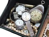 many different types of watches in a case