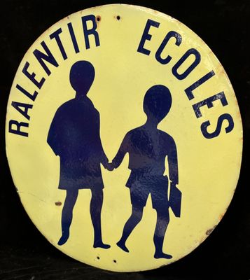 an image of a button with a picture of a boy and a girl holding hands