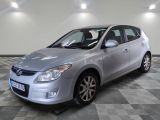 a picture of a silver car on a checkered floor
