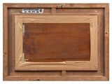 an old picture of a wooden frame with a piece of paper taped around it