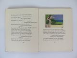 an open book with a picture of a woman on it