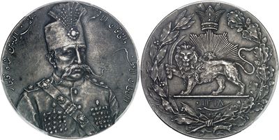an image of a silver coin with a picture of a man on it