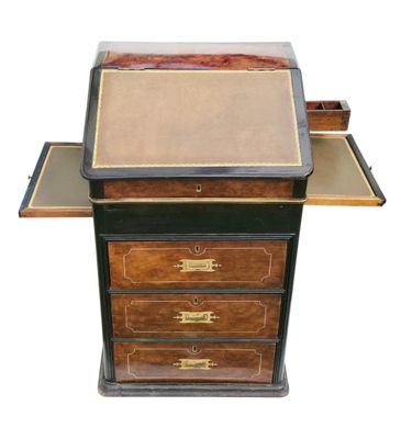 a desk with a drawer and a pen on top of it
