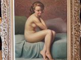 painting of a nude woman sitting on a bed with a blue blanket