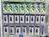 many boxes of cell phones on display in a store