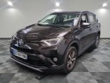 the toyota rav is parked on a checkered floor in a garage