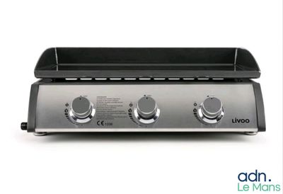 an image of a grill with three burners on it