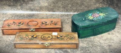 three boxes that are sitting on a carpet