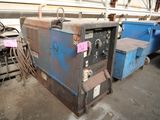 an image of a couple of welding machines sitting in a warehouse