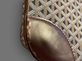 a close up of a purse on a table