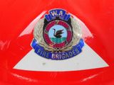 a badge on the back of a red motorcycle