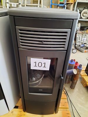 a picture of a stove in a store with a price tag on it