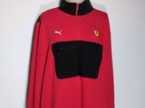 a close up of a red sweatshirt on a mannequin mannequin
