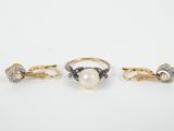 three gold rings with pearls and diamonds