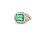 an emerald and diamond ring