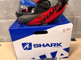 a helmet on top of a box on a table