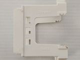 a close up of a piece of white plastic on a white surface