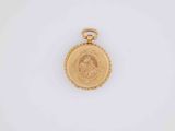 a close up of a gold locke with a picture on it