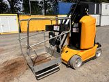 a forklift that is sitting in the dirt