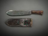 two knives that are sitting next to each other on a table