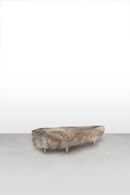 an image of a large piece of wood sitting on top of a white floor