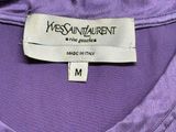 the label on a purple t - shirt reads yes saint laurent